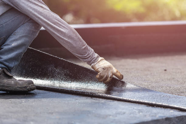 Professional Basement Waterproofing technician working in Hubertus, WI